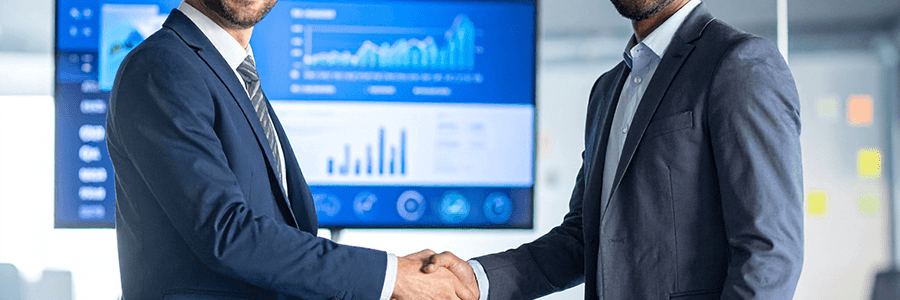Firefly_A business executive shaking hands with a web developer in a modern office, a large s 820067