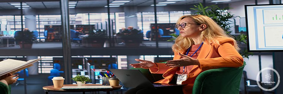 Female business leader in a professional office strategizing for development success, discussing with the main investor. Self accomplished women driving innovation and gender equality. Camera A.