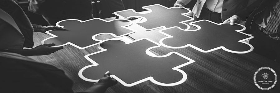 Business people connecting puzzle pieces