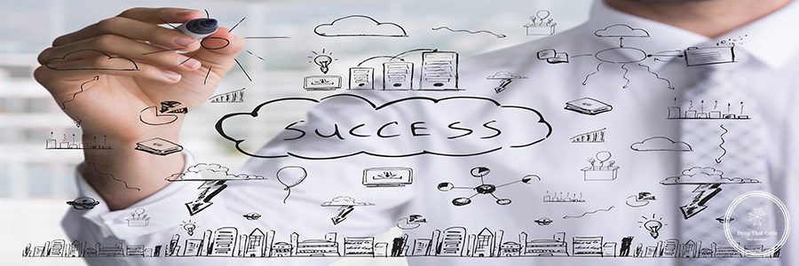 businessman-drawing-keys-success