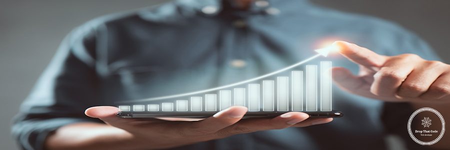 Business man holds a mobile phone and displays a graphic graph showing statistics of profitable graphs, ideas of growth planning and business strategy to see trends in good business.