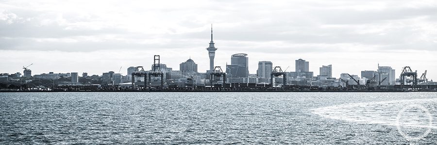 city-waterfront-against-cloudy-sky