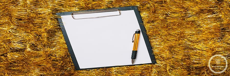 clipboard-with-paper-gold-tinsel