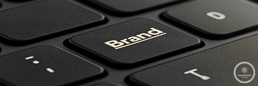 Close-up of keyboard key labeled "Brand" in white on black