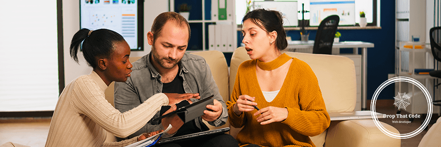 diverse-businesspeople-analysing-financial-project-corporate-meeting-multiethnic-employees-group-listening-colleague-sharing-ideas-discussing-new-marketing-plan-comparing-data-from-tablet