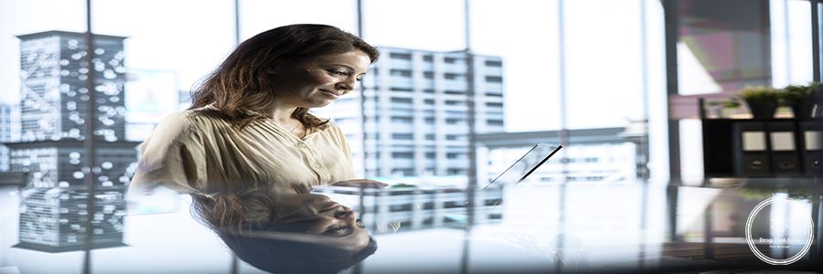 Female entrepreneur working on financial planning and budget allocation, ensuring the company resources are used effectively to achieve maximum profit and long term business objectives.