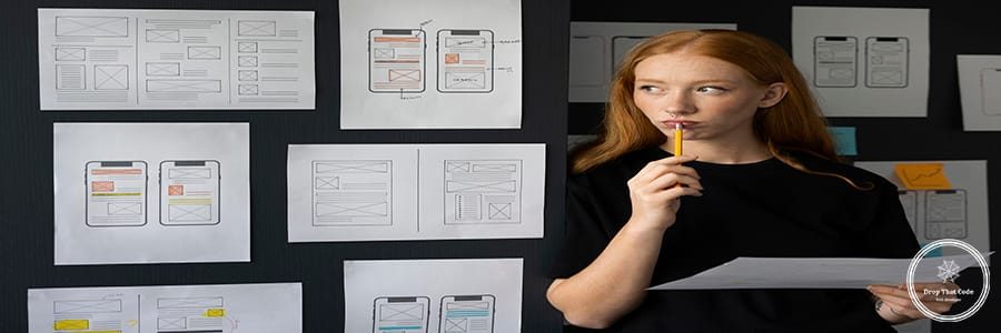 female-web-designer-taking-notes-office