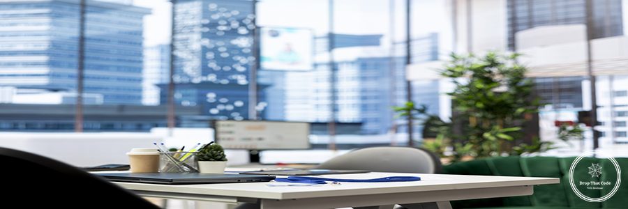 Empty financial department with statistic graphs on computer screen and paperwork files filled with marketing charts. Financial figures on PC device display in bright modern office