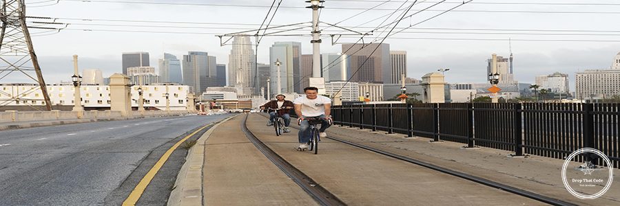 full-shot-men-riding-bicycles