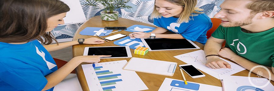 group-people-looking-digital-tablet-with-social-media-icons-workplace