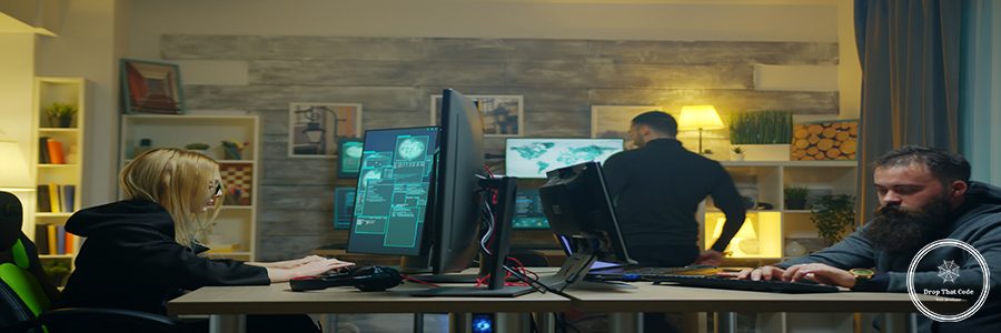 Hacker girl with her team stealing online information using super computers.