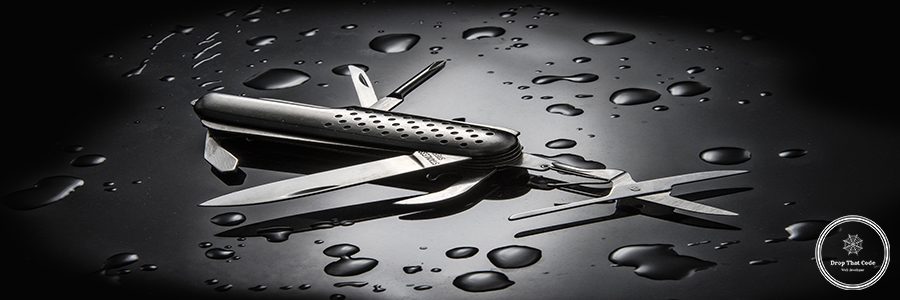 A high angle shot of metal multi-purpose knife with water droplets isolated on black background