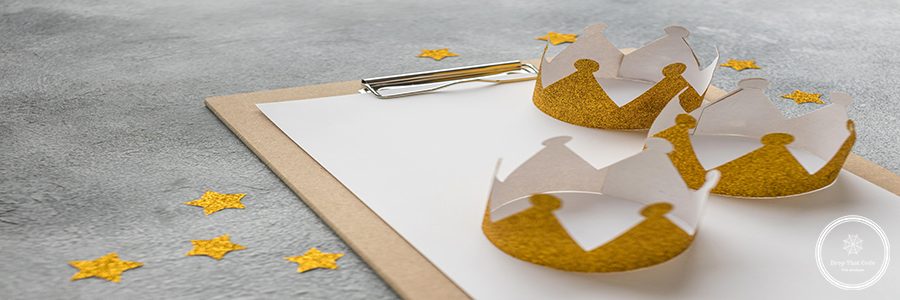 high-angle-three-crowns-epiphany-day-with-notepad