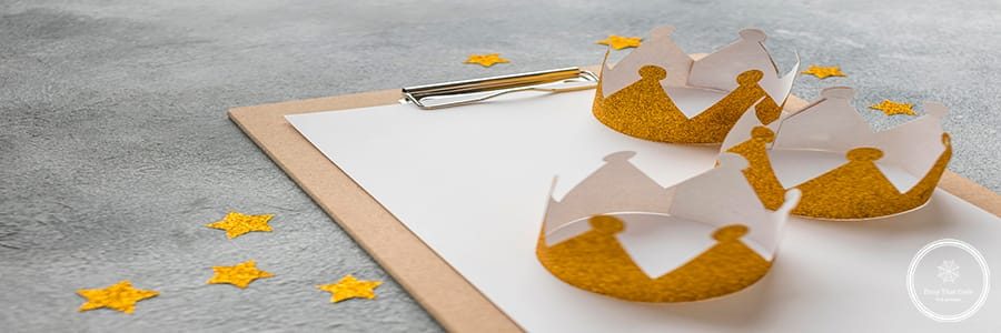 high-angle-three-crowns-epiphany-day-with-notepad