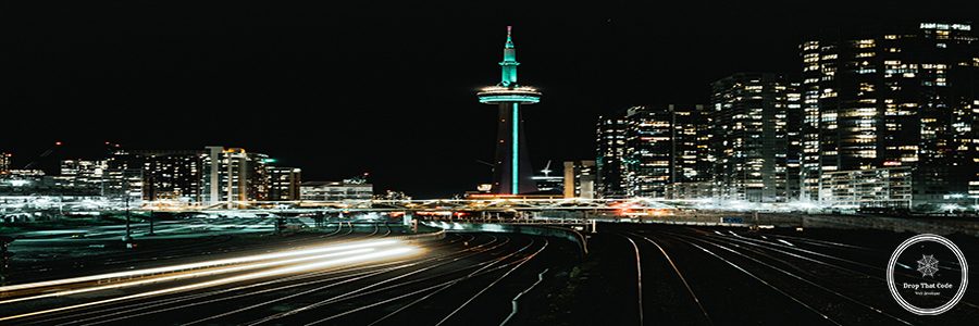 illuminated-city-buildings-night