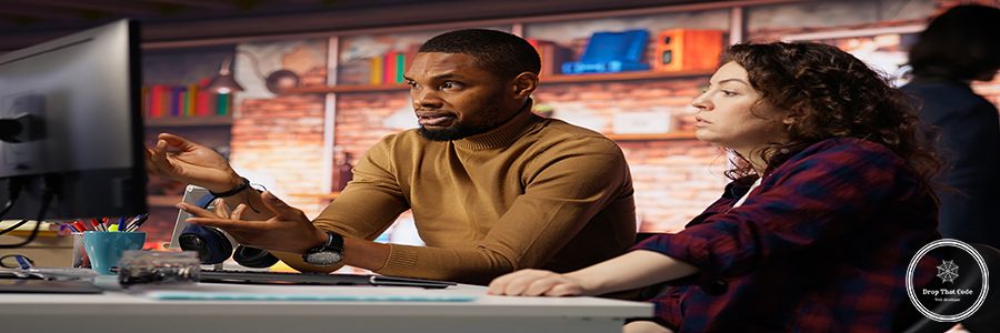 IT employees in startup office working at computer desks, testing and deploying programs and systems. Programmer and developer checking code on desktop PCs, solving tasks in workspace, camera B