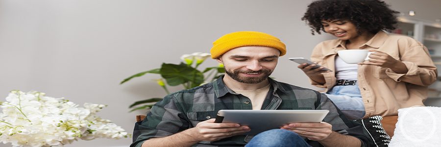 man-holding-tablet-woman-phone