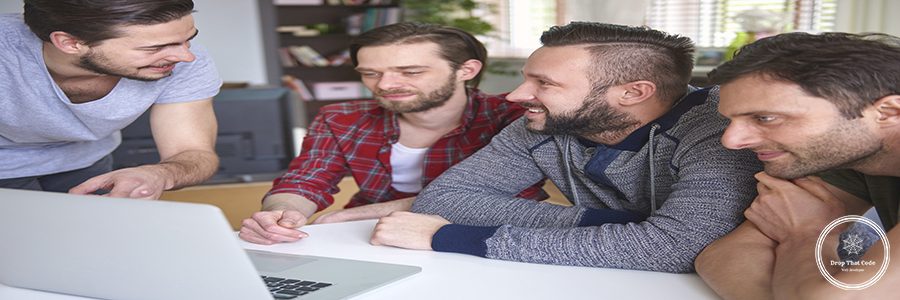 Man standing and explaining his friends how it works