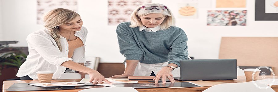Mentor, fashion designer and planning with business people in office for visual merchandiser, campaign layout and textile. Creative director, teamwork and consulting with employee for boutique.