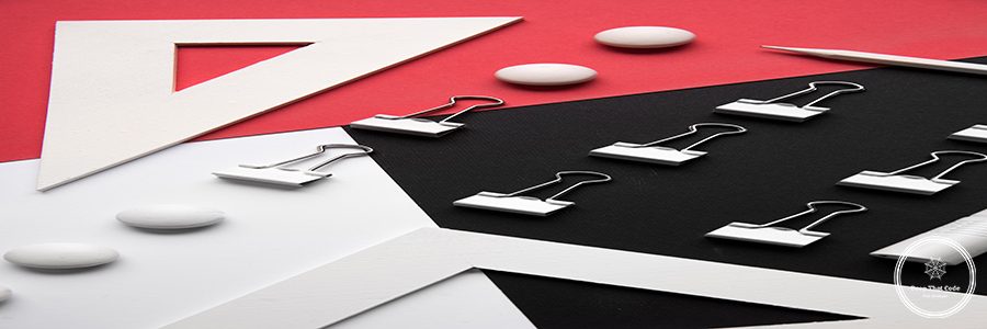 Picture of office supplies on the white red and black background table