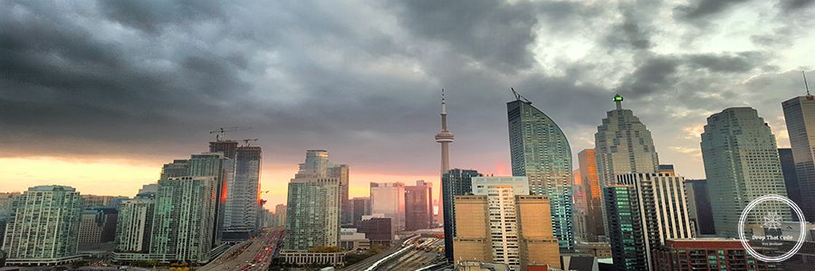 panoramic-view-skyscrapers-against-cloudy-sky