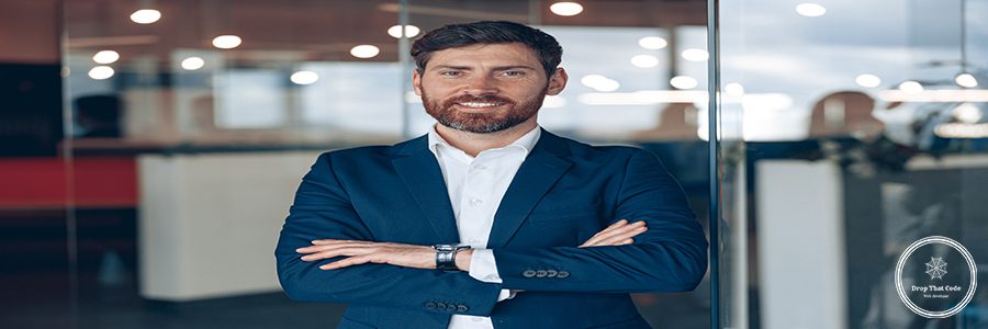 Portrait of a businessman while working in a modern office. Business and success concept