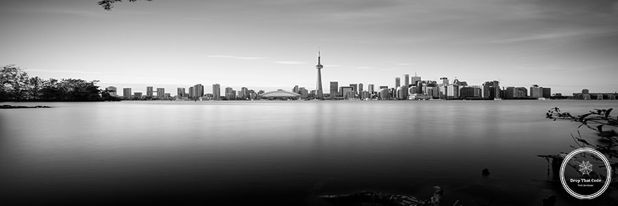 scenic-view-lake-ontario-city-against-sky