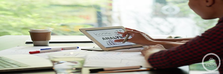 Business executive reading analysis on her digital tablet