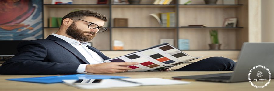 side-view-man-reading-desk