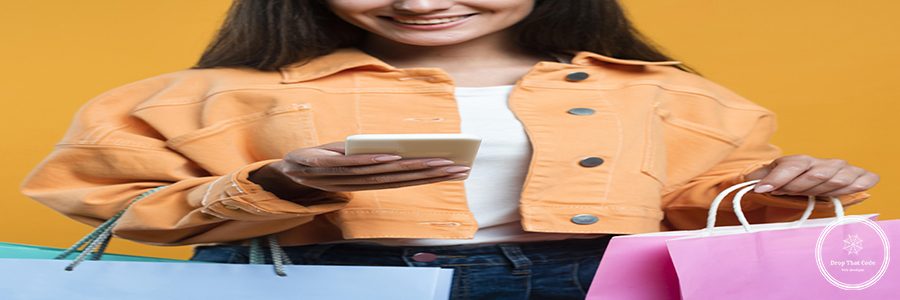 smiley-woman-looking-smartphone-holding-lots-shopping-bags
