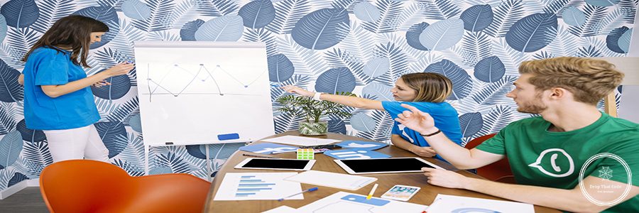 social-media-team-discussing-graph-workplace