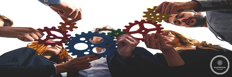 Teamwork of businesspeople work together and combine pieces of gears. Partnership and integration concept