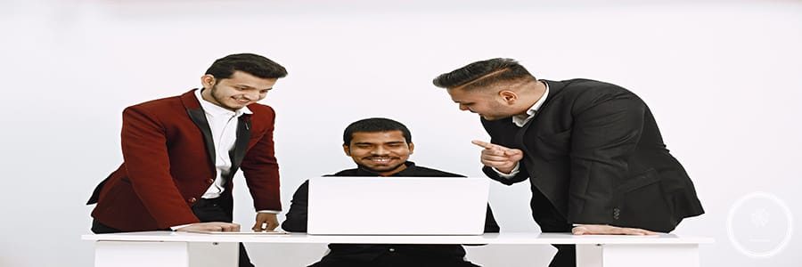 Isolated. Three neb discussing ideas. White background. Indian nationality.