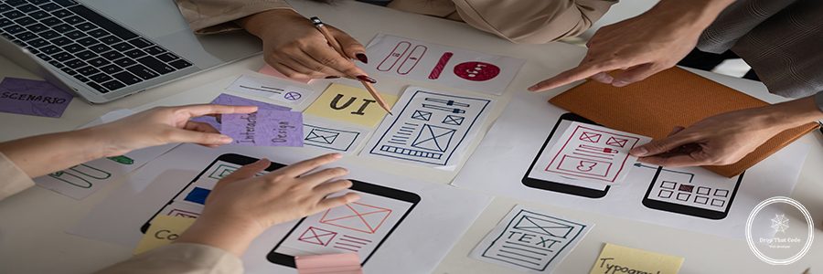 Top view image of a professional and creative UX UI graphic designer team voting a perfect prototype for their new product, discussing and planning work in the meeting.
