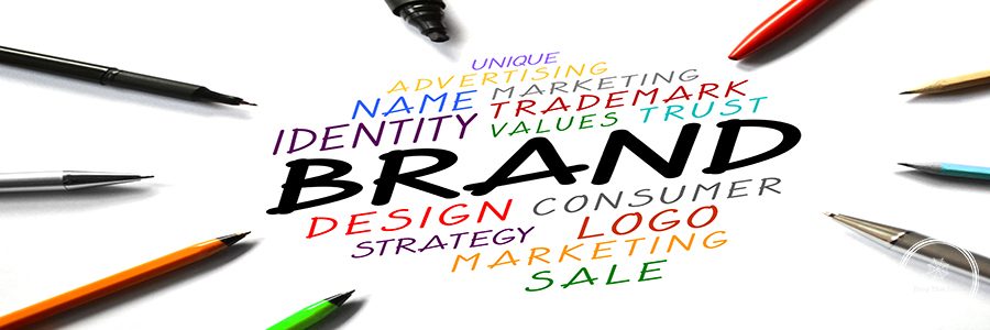Brand word and pens on white background