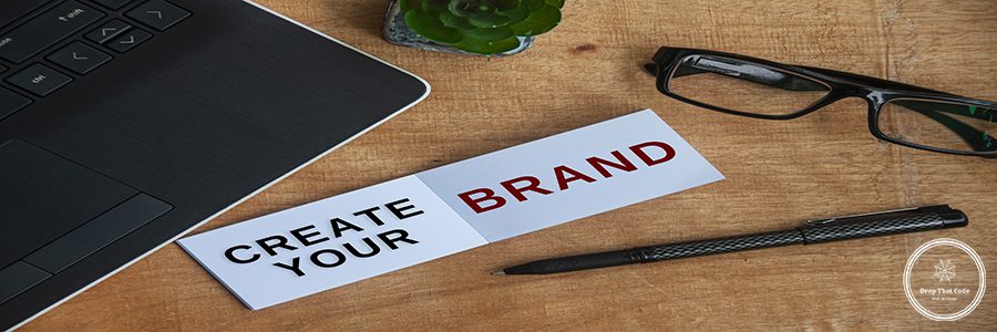 Build your brand text on noted with office setting background.