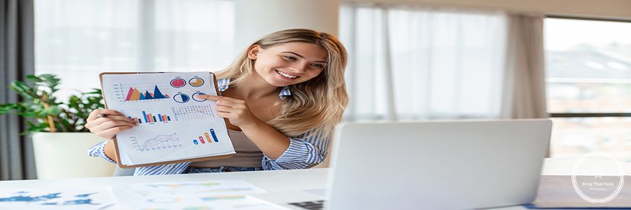Focused business woman presenting charts and graphs on video call online. Young business woman having conference call with client on laptop. Young woman explaining how business work
