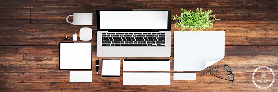 top view of wooden desktop with devices, branding elements and office stuff 3d rendering mockup