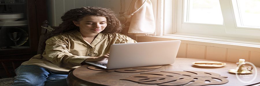 woman-working-laptop-side-view